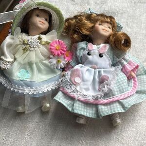 Lot of 2 Ganz porcelain dolls. Issues